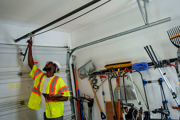 Professional Garage Door Panel Replacement technician working in Wellsville, OH